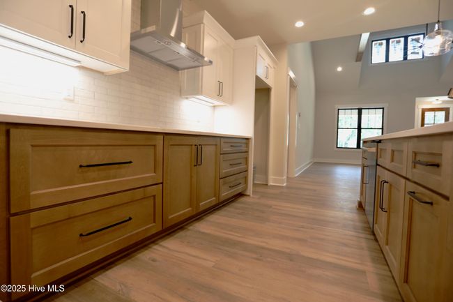 Quartz countertops, tile backsplash | Image 16