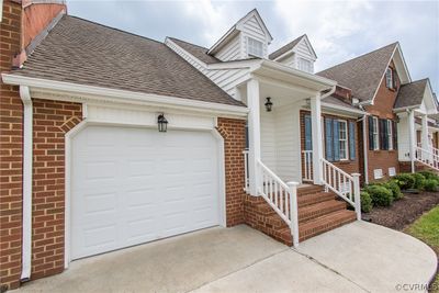 View of front of home featuring a garage | Image 2