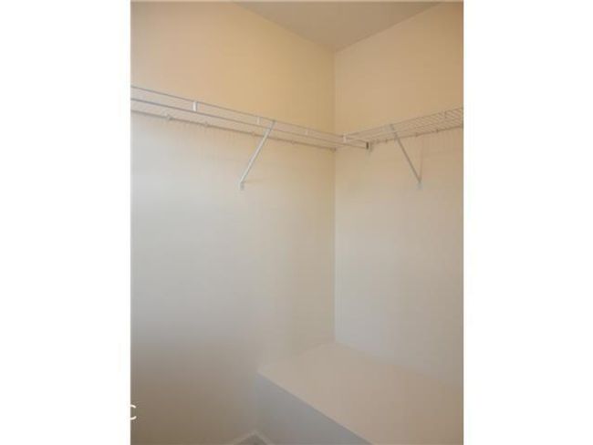 Walk-In Closet. | Image 12