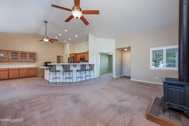 Open floorplan overlooking kitchen breakfast bar | Image 6