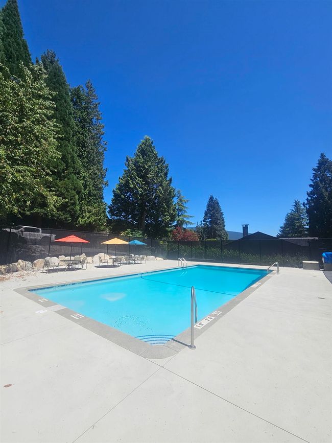 Community pool featuring a patio | Image 26