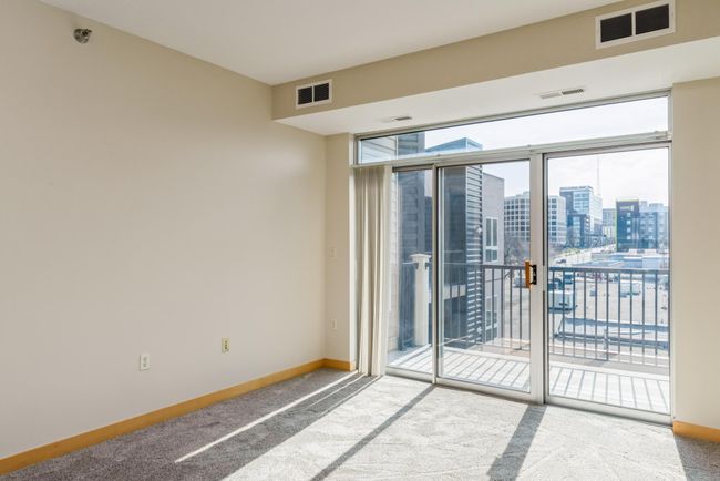 Experience warmth and comfort in the inviting living room. (The photos are of unit 401. Owned by the same person and finishes that are VERY similar) | Image 7