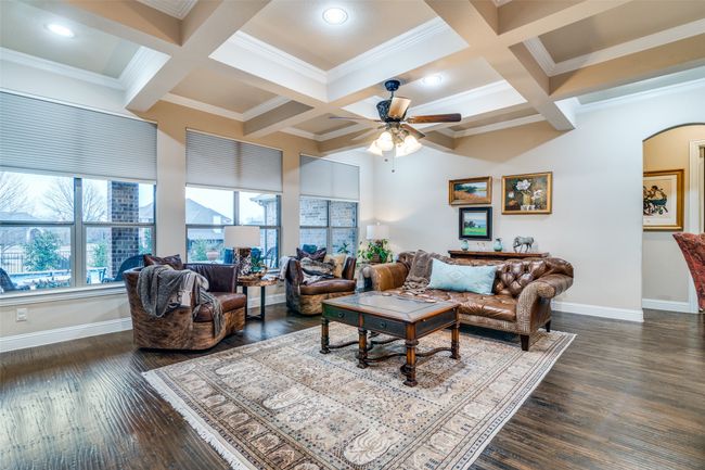There is plentiful space for furniture placement in the living room. | Image 13