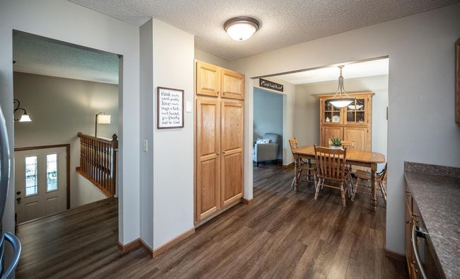 View from kitchen to dining room & foyer. | Image 10