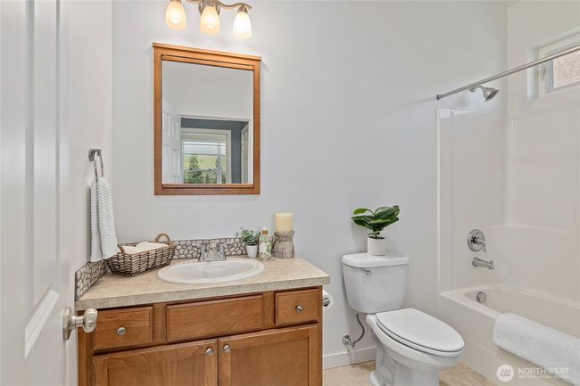 Nice-sized guest bathroom across from guest bedrooms. | Image 20