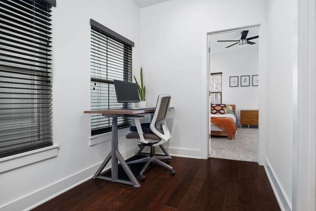 Main level includes an alcove that's perfect for an office. | Image 12