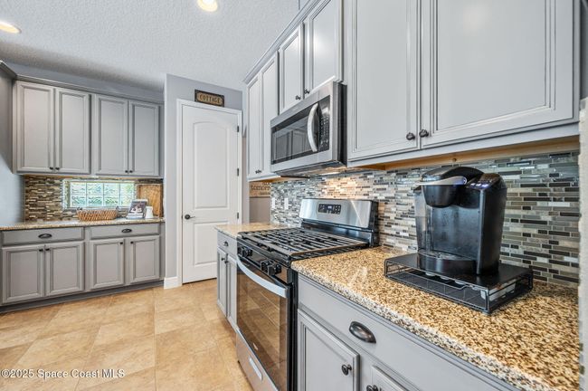 8601 Strom Park Dr, House other with 4 bedrooms, 2 bathrooms and null parking in Melbourne FL | Image 17
