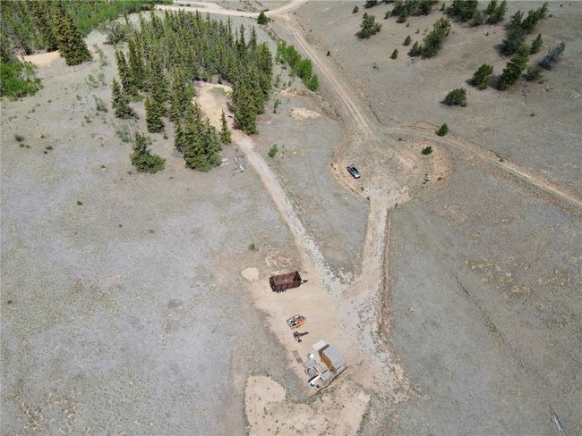 Aerial view of sparsely populated area with a desert landscape | Image 14