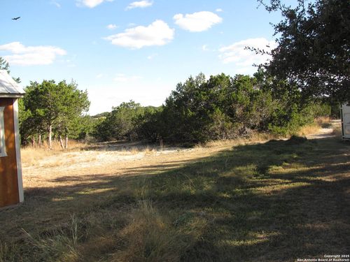 698 Panther Hollow Dr, Bandera, TX, 78003-5911 | Card Image