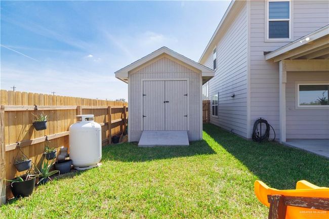 View of shed featuring fence | Image 16