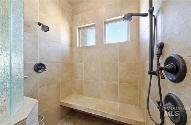 Full bathroom featuring a tile shower | Image 21