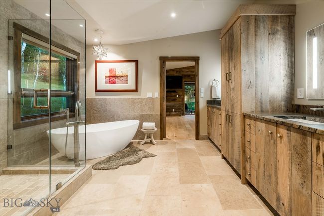 Primary bathroom with oversized shower and soaking tub. | Image 31