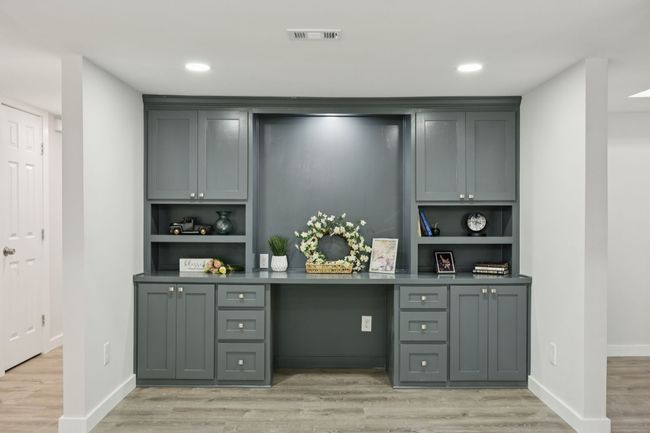 This CUSTOM made Built-in is ready to be used as a home office or study area - simply beautiful! | Image 12