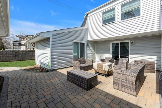View of patio / terrace featuring outdoor lounge area and fence | Image 14