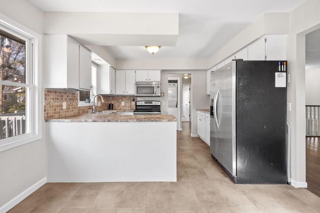 Large Kitchen, informal dining room - Upper Unit | Image 8