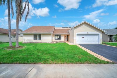 8311 Nw 51st Ct, House other with 4 bedrooms, 2 bathrooms and null parking in Lauderhill FL | Image 1