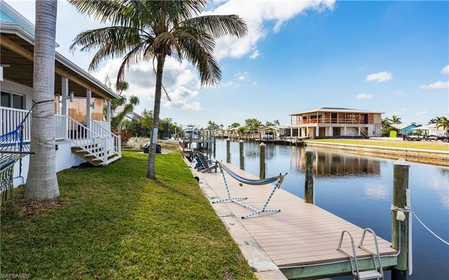 12277 Boat Shell Dr, House other with 3 bedrooms, 3 bathrooms and 3 parking in MATLACHA ISLES FL | Image 6