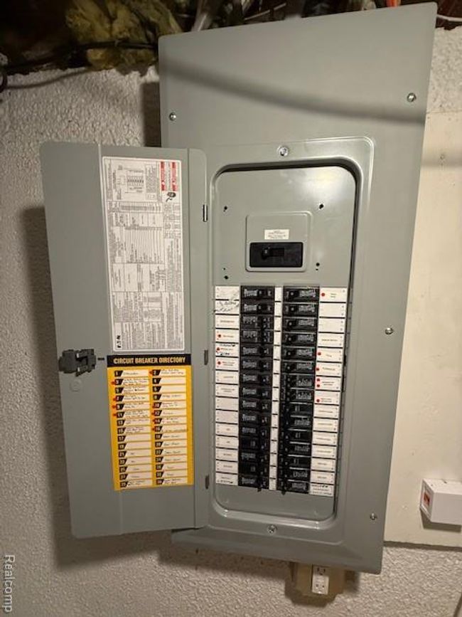 Utility room featuring electric panel | Image 27