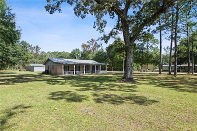 View of yard with a porch | Image 3