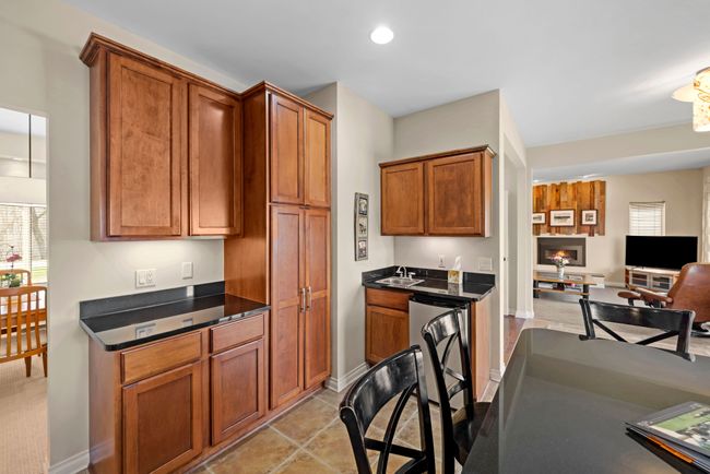 Pantry. Wet bar in corner- Bar frig INcluded | Image 26