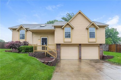 406 Huntington Dr, Greenwood, MO, 64034-9335 | Card Image