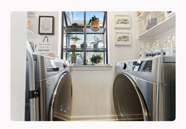 Washroom featuring washer and clothes dryer | Image 16