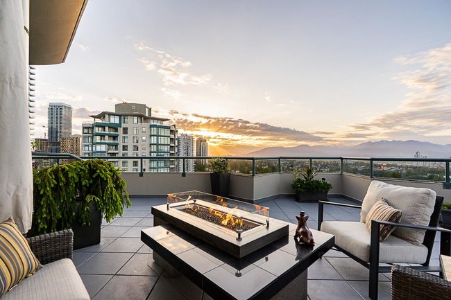 Balcony with an outdoor living space with a fire pit, a mountain view, and a city view | Image 21