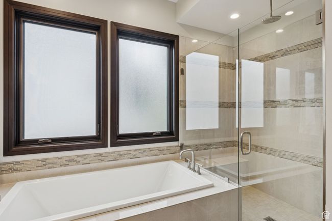 Full bath with a shower stall, a bath, and recessed lighting | Image 38