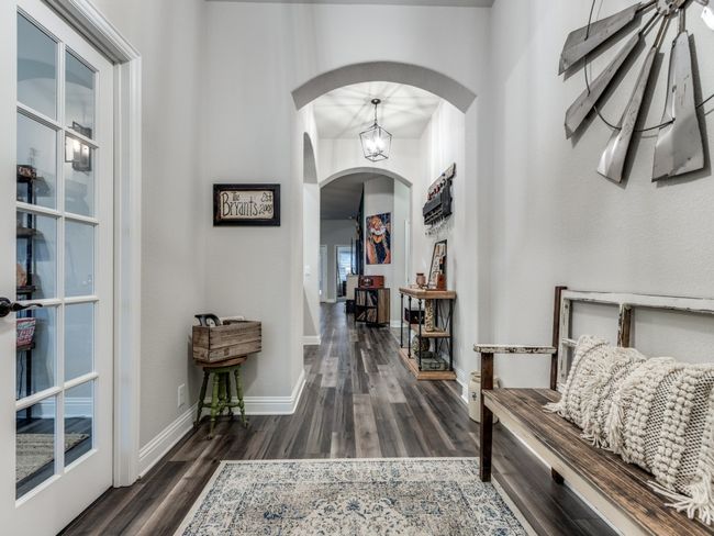 Hall with dark hardwood / wood-style flooring | Image 12