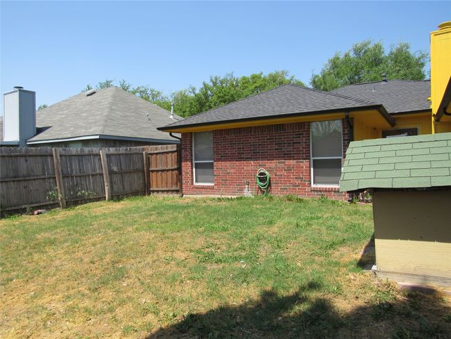 View of yard featuring fence | Image 24