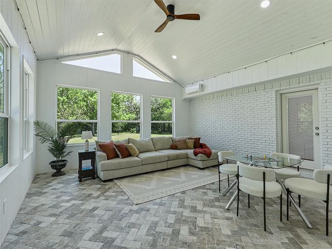 Sunroom / solarium with a wall mounted AC and a healthy amount of sunlight | Image 21
