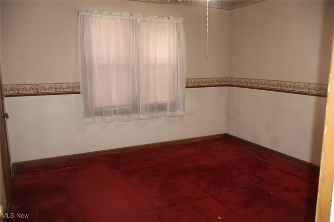 Unfurnished room with baseboards | Image 6