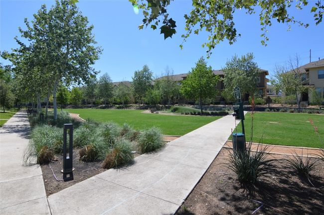 View of home's community featuring a yard | Image 34