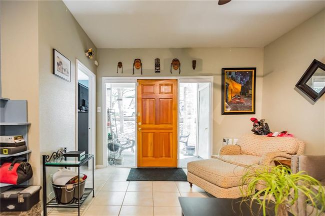Foyer entrance featuring light tile patterned floors | Image 6