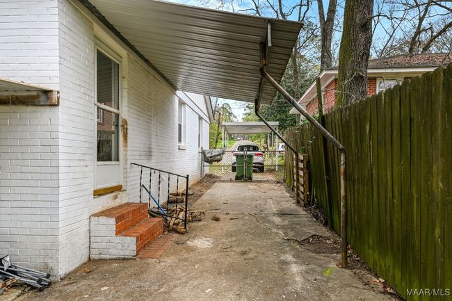 Covered side entrance off carport | Image 36