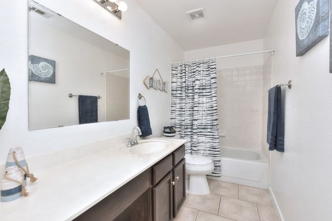 Secondary bathroom was lots of countertop space! | Image 30