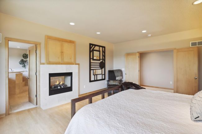 Private, owners sweet features beautiful flooring and gorgeous, solid wood French doors! | Image 48