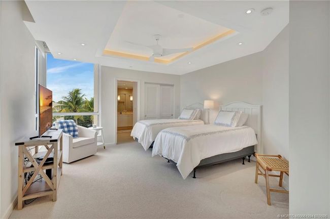 Guest bedroom #3 with trayed ceiling | Image 32
