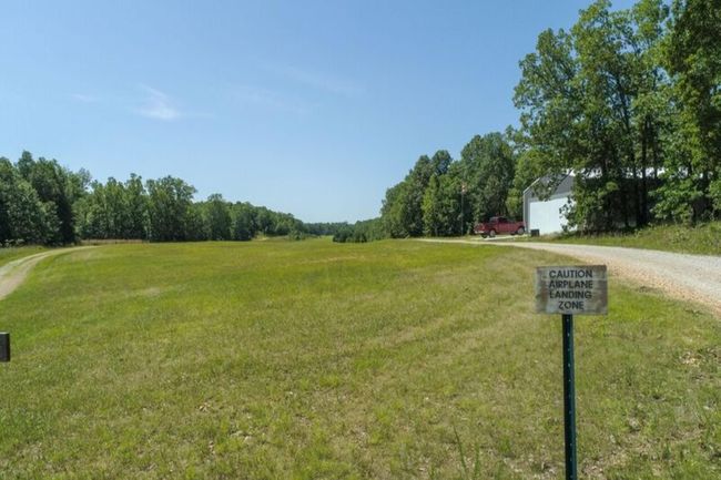 Airstrip and road runs three ways around | Image 21