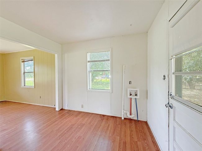 Unfurnished room featuring baseboards and light wood-type flooring | Image 15