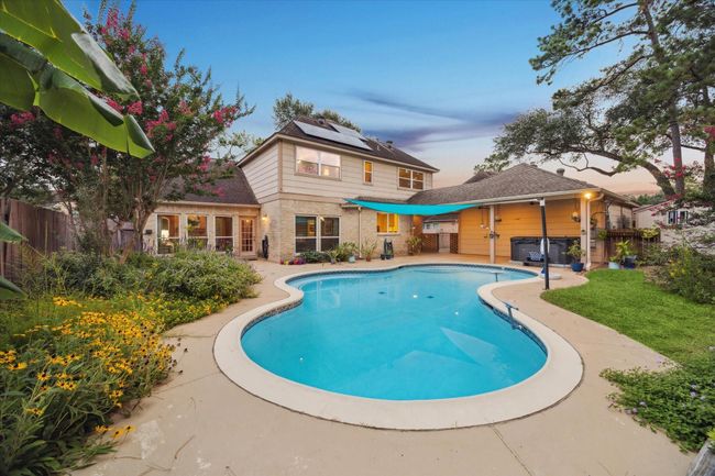 One last look at the pool and back yard from the far corner of the lot. | Image 35