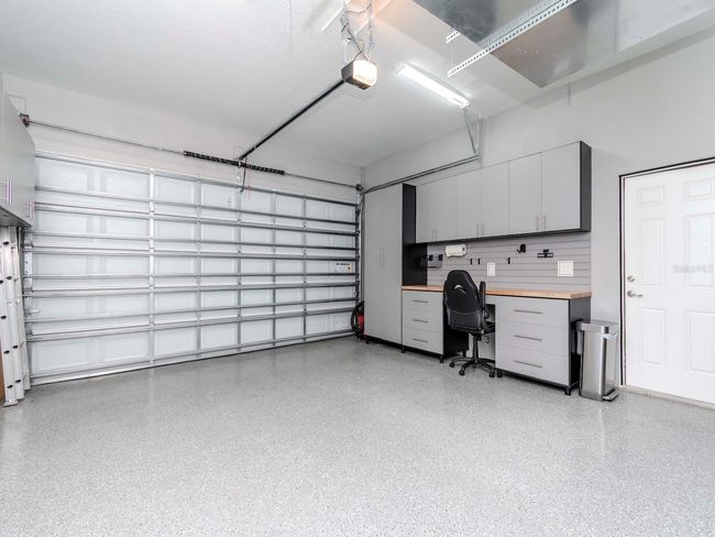 2 CAR ATTACHED GARAGE WITH EPOXY FLOORS & CABINETS AND WORK BENCH | Image 28