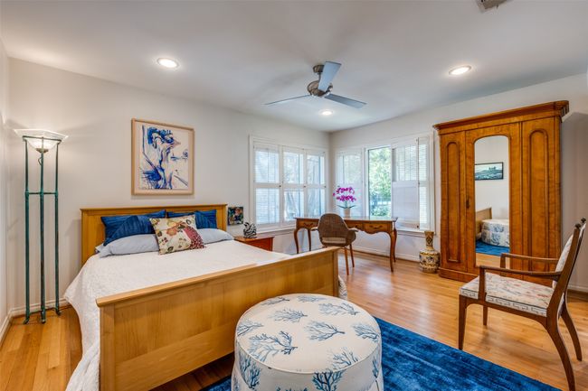Bedroom with ceiling fan and light hardwood / wood-style flooring | Image 20