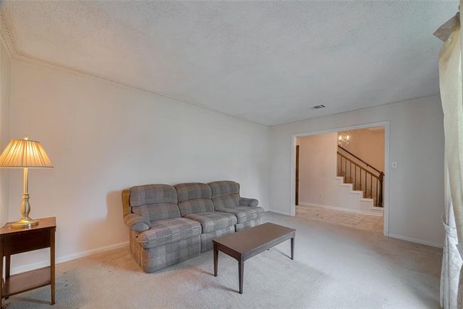 View from the formal living room toward the foyer. | Image 18