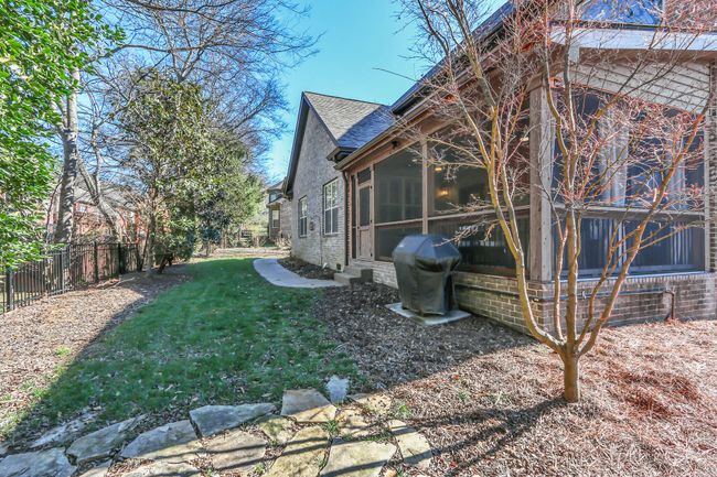 Landscaped so you can move right in and enjoy! Gas Grill will remain for your summertime entertaining! | Image 51