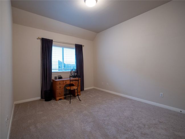 Bedroom #2 with light colored carpet, and vaulted ceiling | Image 20