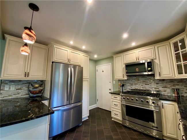Walk from the garage right into the kitchen! | Image 11