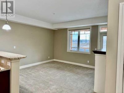 1232 - 2330 Fish Creek Blvd Sw, Condo with 1 bedrooms, 1 bathrooms and 1 parking in Calgary AB | Image 2