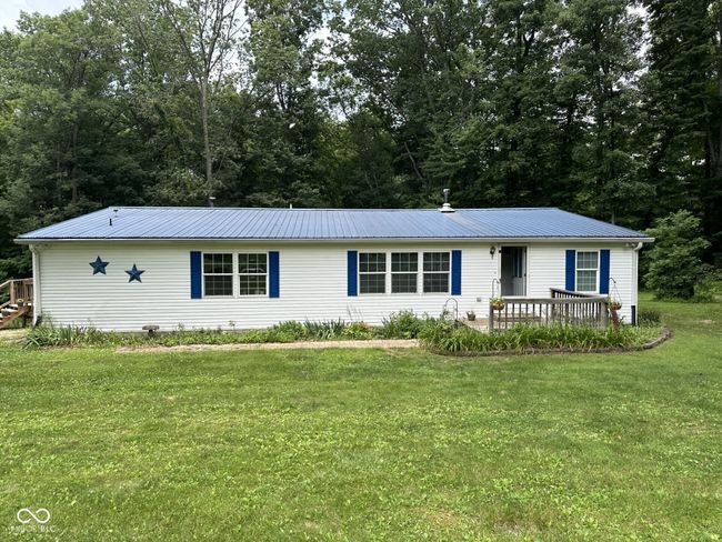 Welcome home to this three bed, three full bath home. | Image 1