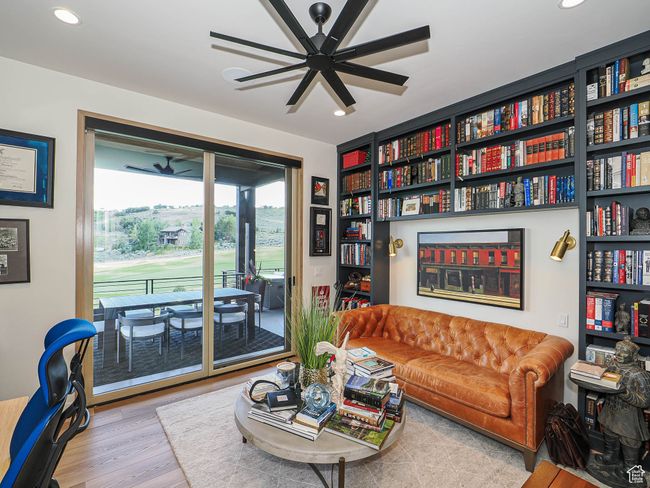 Living room featuring wood finished floors, recessed lighting, and ceiling fan | Image 47